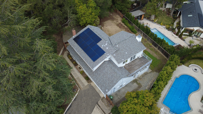 Aerial view of the roof of a California home with solar panels installed