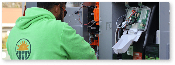 person installing back up battery
